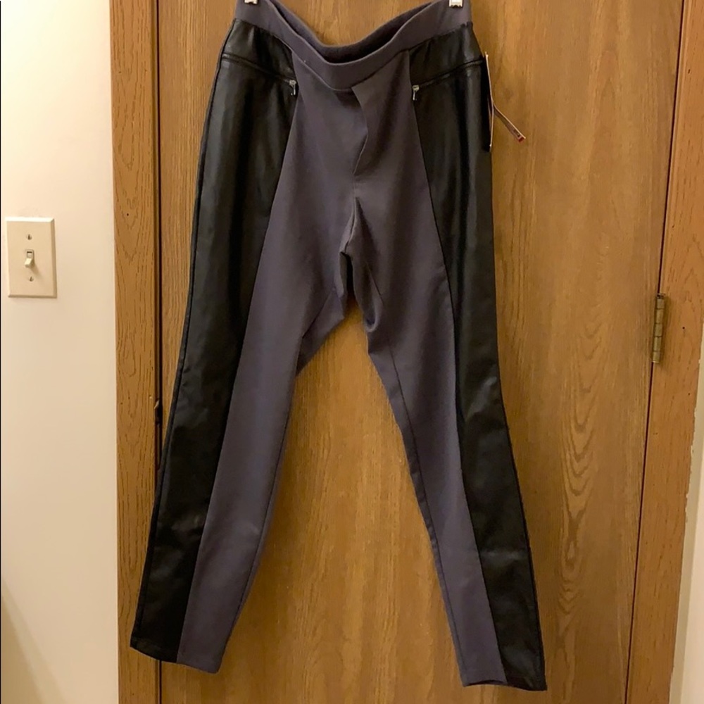 Black dress pants with panel detail on edge of leg